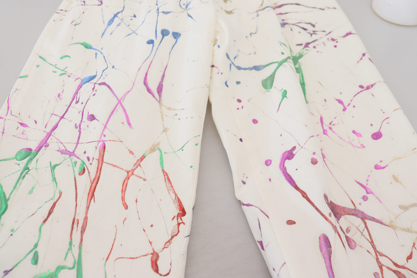 Dolce & Gabbana Chic White Splash Print Denim Pants